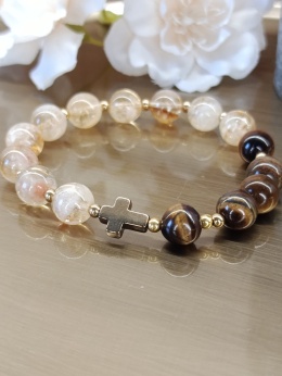 Bransoletka różaniec z cytrynu i tygrysiego oka. Na gumce, krzyżyk stalowy